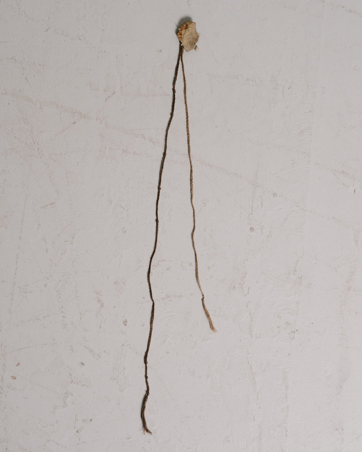 river stone brooch two